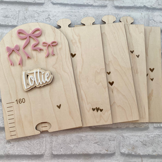 Bow design wooden height chart